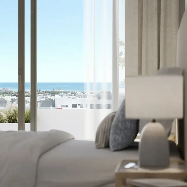 Infografía 3D de dormitorio con vistas al mar de Vanian Garden, promoción residencial en Estepona (Málaga) (González & Jacobson Arquitectura)