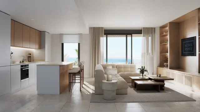 Infografía 3D de salón con cocina abierta de Vanian Park, promoción residencial en Estepona, Málaga (HCP Arquitectos)
